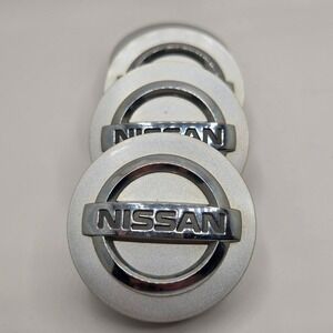 Nissan Wheel Center Caps Set of 4 Silver Chrome Logo OEM